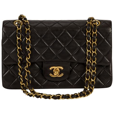 white gold chanel purse|black and gold Chanel bag.